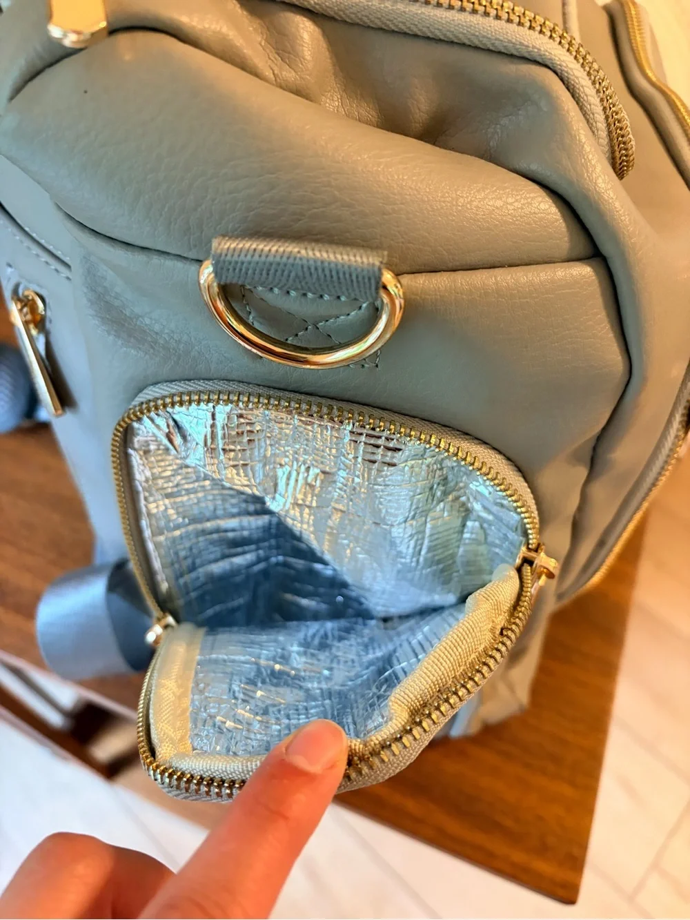 Stylish Cream Baby Bag Backpack with Gold Hardware